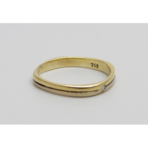 1001 - An 18ct gold ring marked 750, set with a diamond, 1.7g, J