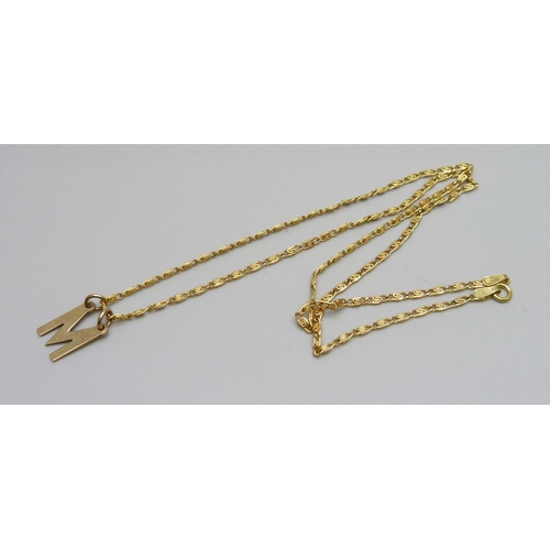 1002 - A 9ct gold 'M' pendant on a 9ct gold chain, 2.8g, 46cm chain