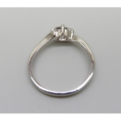 1010 - An 18ct white gold plated dress ring, O/P