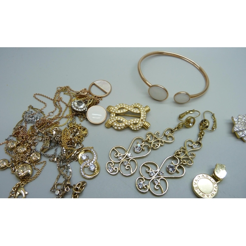 1033 - A collection of designer jewellery including Skagen, Aurora, Corocraft, Sarah Coventry, Swarovski, e... 