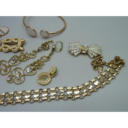 1033 - A collection of designer jewellery including Skagen, Aurora, Corocraft, Sarah Coventry, Swarovski, e... 