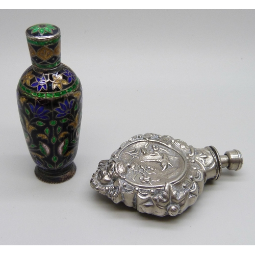 1041 - A cloisonné white metal and enamel scent bottle, 7cm tall, and another embossed scent bottle