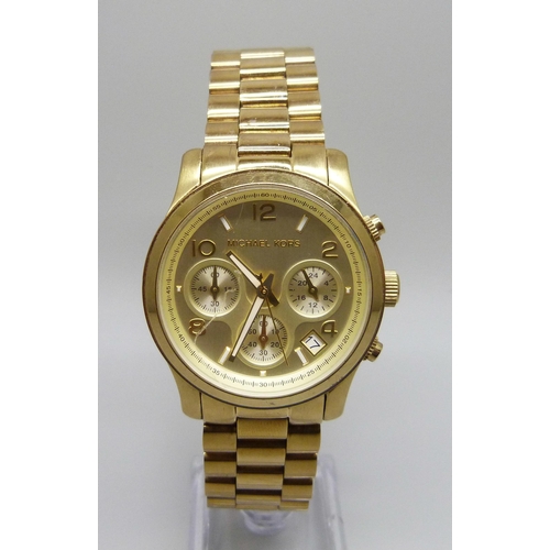 1042 - A Michael Kors gold tone chronograph wristwatch, 40mm case including crown