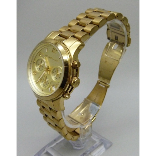 1042 - A Michael Kors gold tone chronograph wristwatch, 40mm case including crown