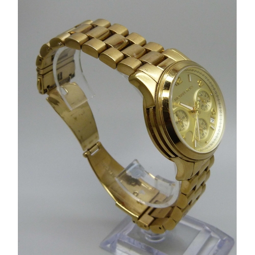 1042 - A Michael Kors gold tone chronograph wristwatch, 40mm case including crown