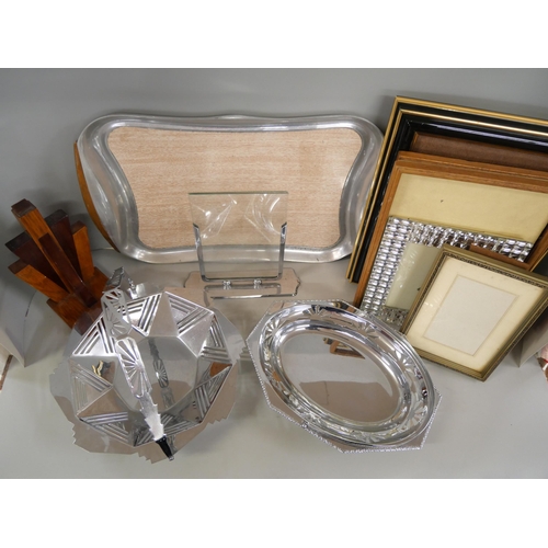 1063 - Two 1930s chrome dishes, a collection of picture frames, wooden book, tray, a catalogue for the sale... 