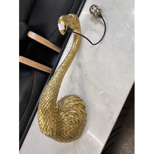 3145 - A wall light in the form of a golden flamingo