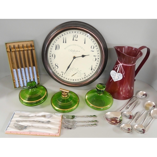 1087 - A collection of dessert forks, knifes and spoons, wooden clock, three green glass jars and metal jug... 