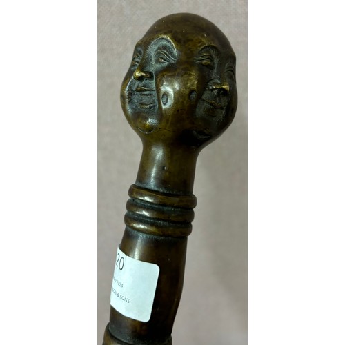 320 - An Oriental bronze handled walking cane