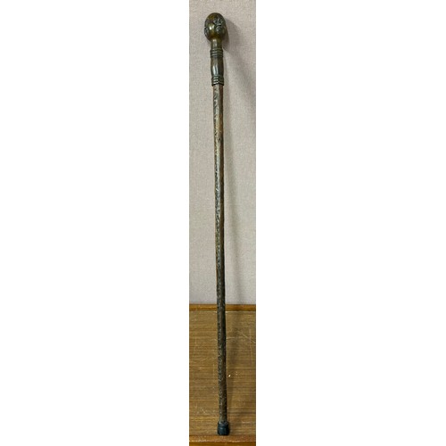 320 - An Oriental bronze handled walking cane