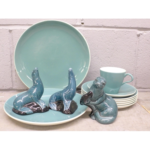 1110 - Mixed china including Poole pottery plates, two seal figures and a figure of an otter **PLEASE NOTE ... 