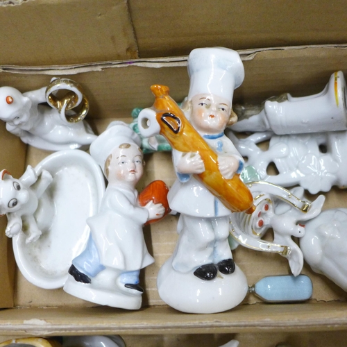 1124 - A collection of Victorian bisque ornaments and fairings **PLEASE NOTE THIS LOT IS NOT ELIGIBLE FOR I... 