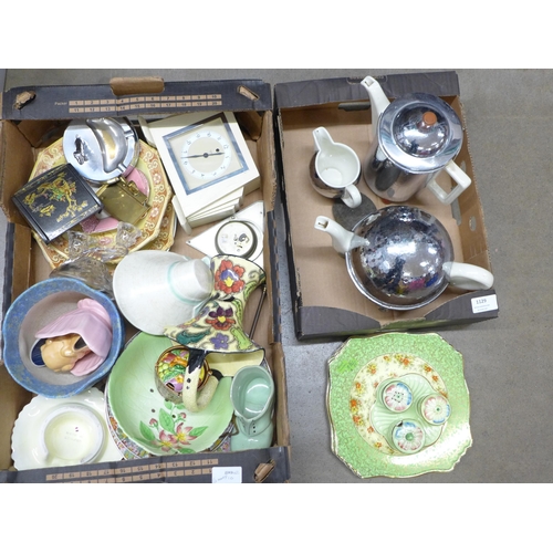 1129 - A collection of 1930s china including a Noritake jar, two Art Deco clocks, cruet, ashtrays, three pi... 