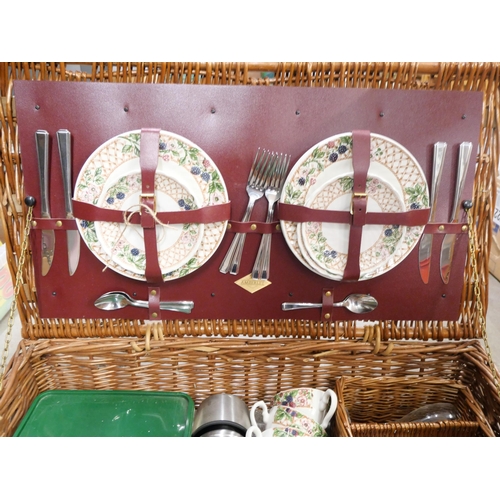 1135 - An Amberley wicker picnic basket with contents **PLEASE NOTE THIS LOT IS NOT ELIGIBLE FOR IN-HOUSE P... 