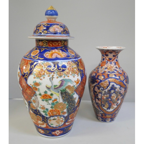 606 - A Japanese Imari vase, 22cm and an Imari vase and cover