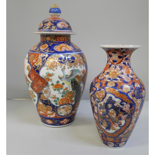 606 - A Japanese Imari vase, 22cm and an Imari vase and cover