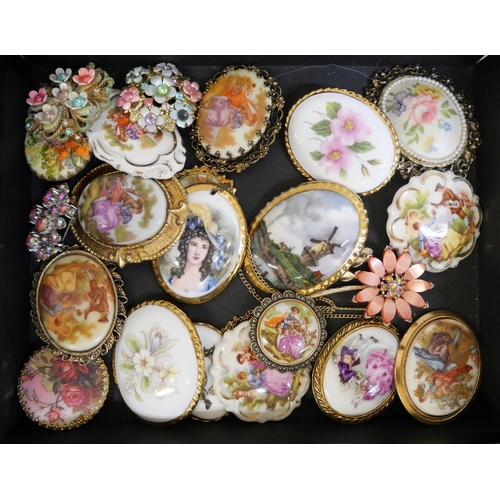 622 - A collection of ceramic floral brooches and other plaque brooches, cameos, etc. and a portrait minia... 