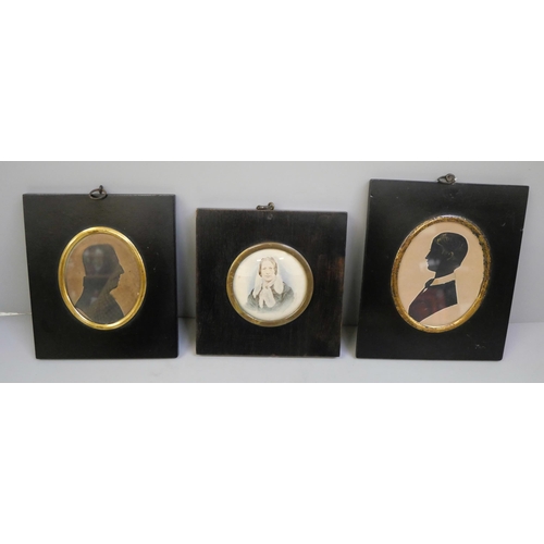 632 - A Victorian miniature watercolour and two sillouettes, gentleman and young boy, all in ebony frames