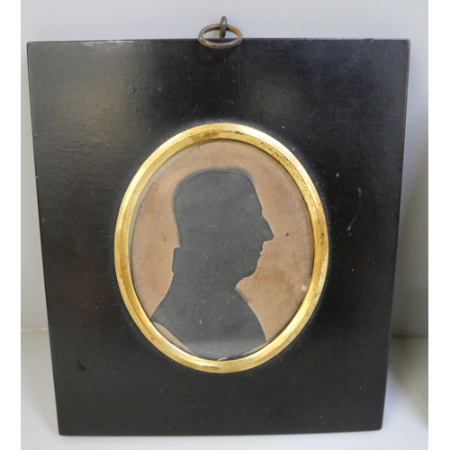 632 - A Victorian miniature watercolour and two sillouettes, gentleman and young boy, all in ebony frames