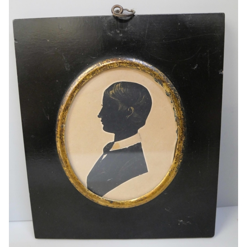 632 - A Victorian miniature watercolour and two sillouettes, gentleman and young boy, all in ebony frames