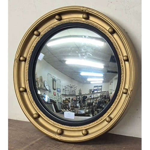 367 - A Regency style gilt framed convex mirror