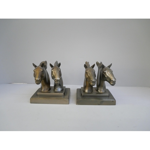 643 - A pair of Frankart mustang horse bookends, early 20th Century