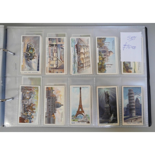 647 - An album with 14 sets of cigarette cards