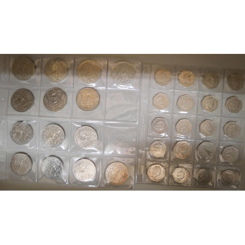 648 - A small collection of twenty 50 pence commemorative coins plus fourteen commemorative crowns