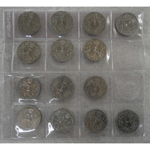 648 - A small collection of twenty 50 pence commemorative coins plus fourteen commemorative crowns