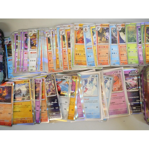 658 - 70+ holographic and reverse holo Pokemon cards, all Black Star including 151 Scarlett & Violet