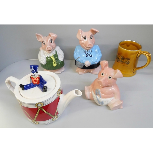 667 - Five pieces of Wade, Nat West pig money boxes, mug and teapot **PLEASE NOTE THIS LOT IS NOT ELIGIBLE... 