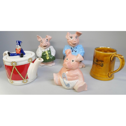 667 - Five pieces of Wade, Nat West pig money boxes, mug and teapot **PLEASE NOTE THIS LOT IS NOT ELIGIBLE... 