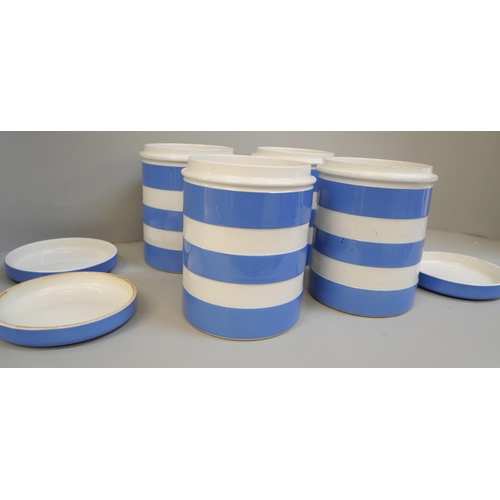 677 - Four TG Green Cornish ware storage jars, one a/f