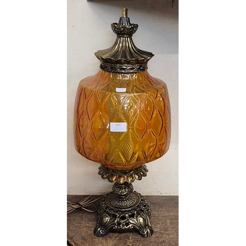 369 - A Victorian style gilt metal and orange glass table lamp