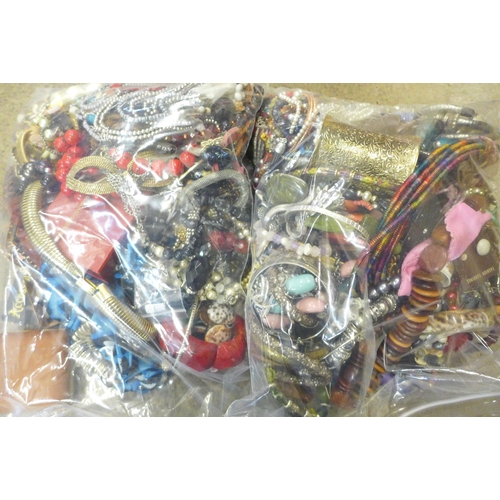 715 - Two bags of costume jewellery