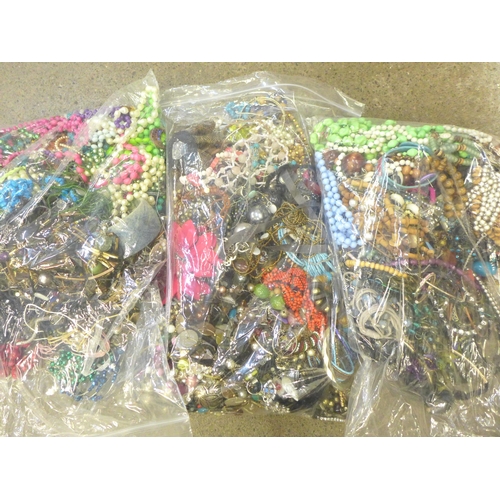 729 - Three bags of costume jewellery