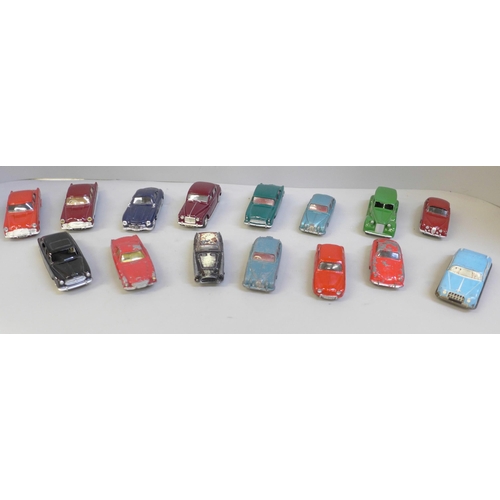 730 - Fourteen Dinky, Corgi and Solido model vehicles and a GTP tin plate car