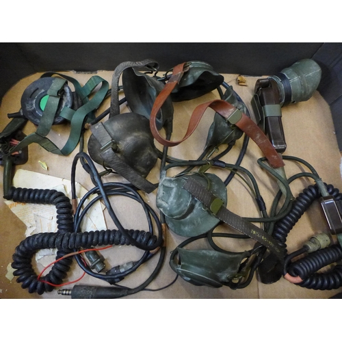 731 - A collection of WWII original Military radio operators headsets, clip on field microphone, etc., inc... 