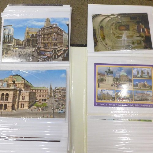 738 - A large collection of mid 20th Century postcards, 14 albums in total