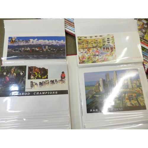 738 - A large collection of mid 20th Century postcards, 14 albums in total