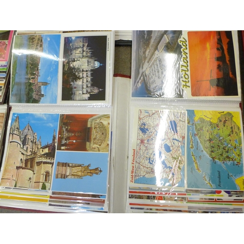 738 - A large collection of mid 20th Century postcards, 14 albums in total