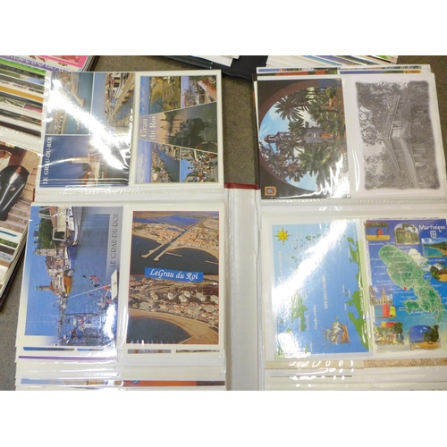 738 - A large collection of mid 20th Century postcards, 14 albums in total