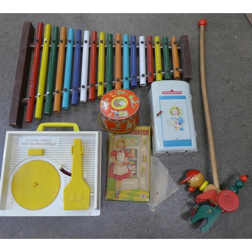 741 - A Modern Toys Japan Refrigerator, boxed, a Fisher Price music box record player, toy xylophone and o... 