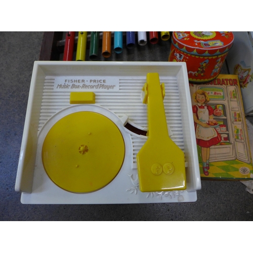 741 - A Modern Toys Japan Refrigerator, boxed, a Fisher Price music box record player, toy xylophone and o... 