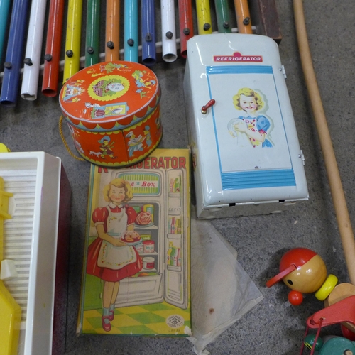 741 - A Modern Toys Japan Refrigerator, boxed, a Fisher Price music box record player, toy xylophone and o... 