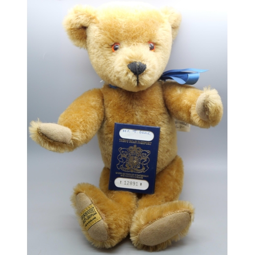 745 - A Merrythought bear by Oliver Holmes with a teddy bear passport