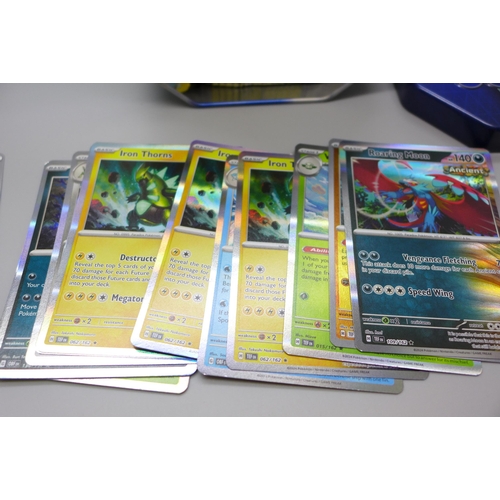 746 - Large quantity of Pokemon cards in two collectors tins, approximetely 600 cards, including Holograph... 