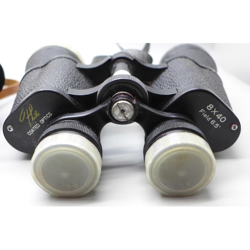 751 - Two pairs of binoculars including Boots 10 x 50, both with cases