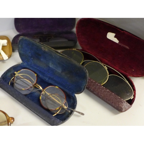 774 - A collection of Ray Ban glasses and cases and other vintage glasses (14 items)