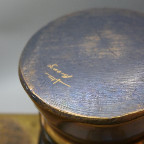 791 - A heavy bronze pestle and mortar and a bronze tray with anchor decoration